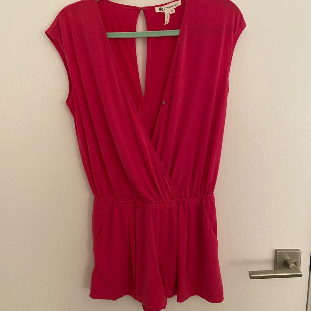 Pink romper.